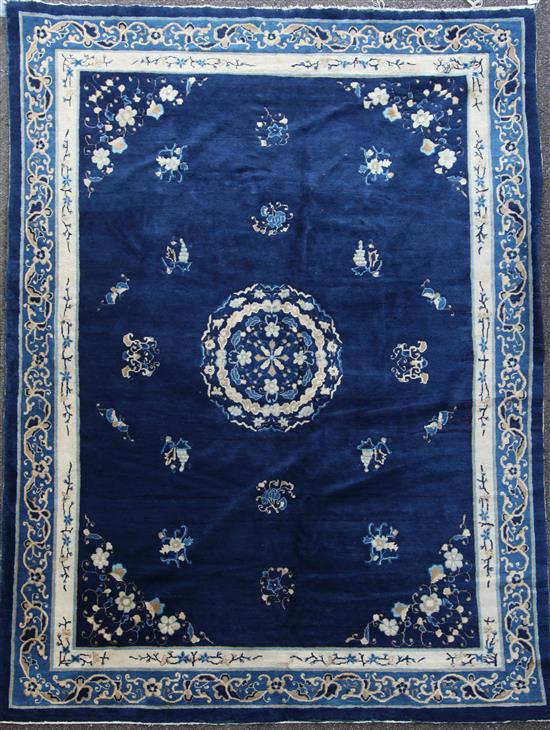 A late 19th century Peking carpet, 11ft 5in by 9ft 1in.